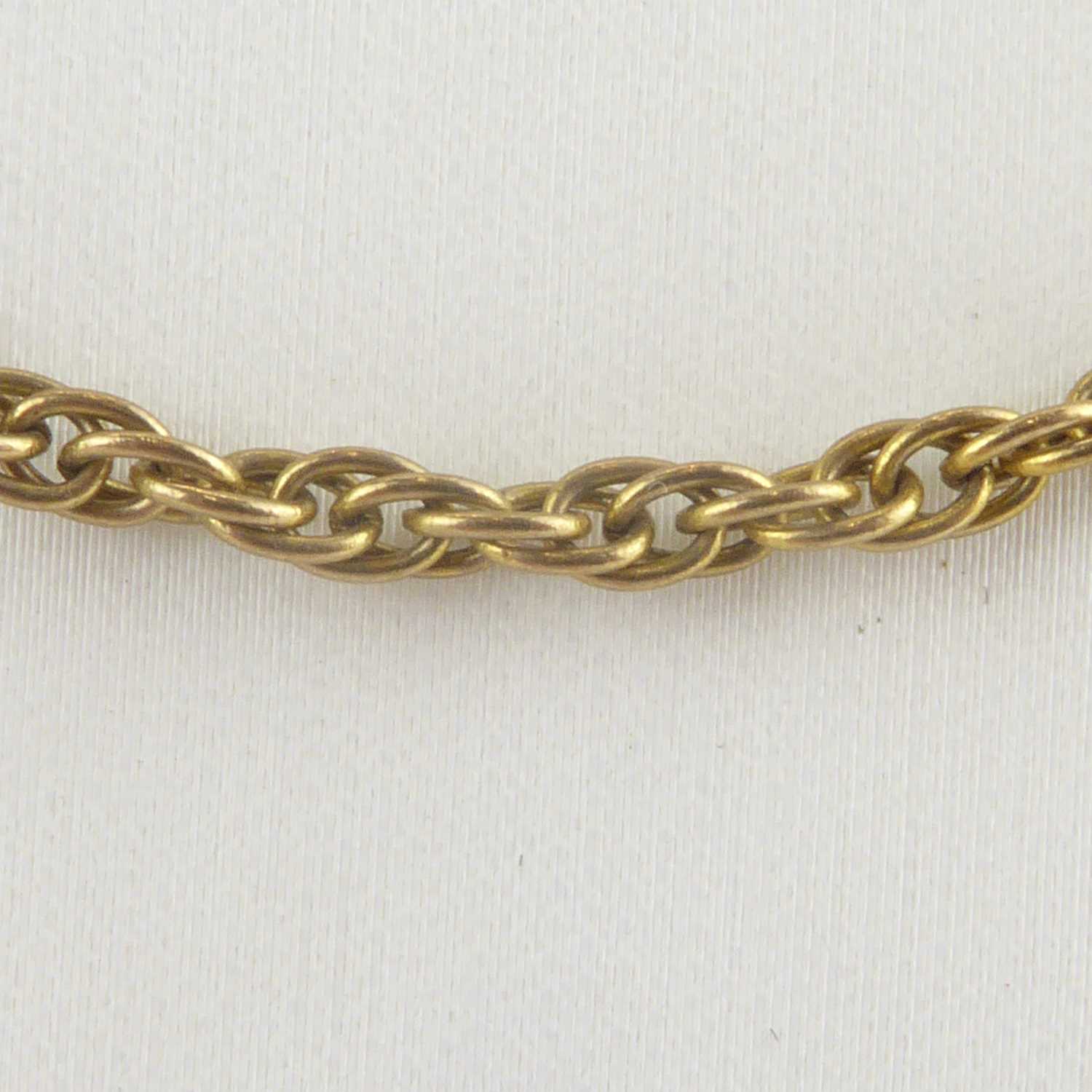 Lot 1138 - A 9ct gold thin belcher link chain with ring...