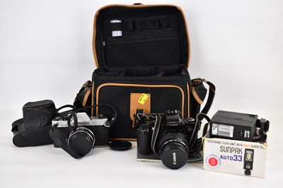 Lot 575 - A Rolleiflex SL35 35mm SLR camera lens in case,...