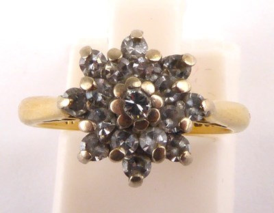 Lot 904 - An 18ct gold diamond flower cluster ring...