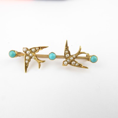 Lot 1075 - A vintage gold brooch modelled as two swallows...