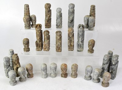 Lot 140 - A 20th century carved soapstone chess set...