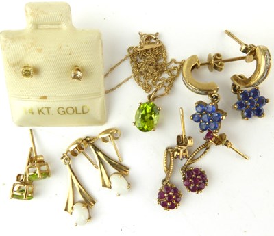 Lot 1187 - Three pairs of 9ct gold earrings comprising...