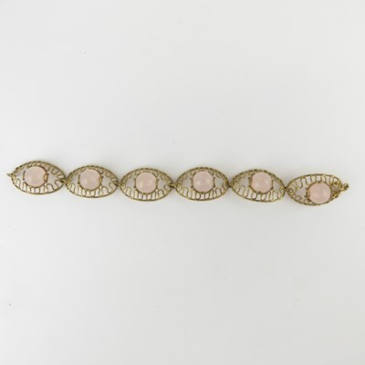 Lot 1057 - An 8ct gold (marked 333) rose quartz fancy...