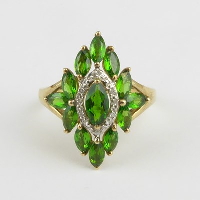 Lot 958 - A 9ct gold green stone cluster dress ring,...