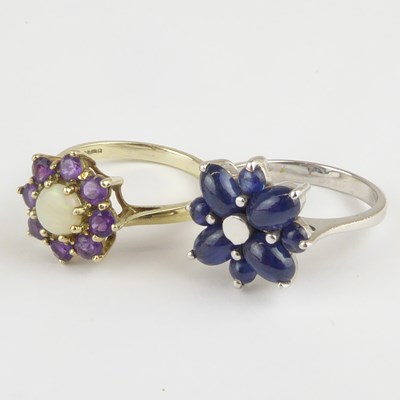 Lot 949 - Two 9ct white gold flower cluster rings,...