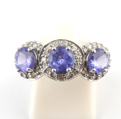 Lot 858 - A 14ct white gold tanzanite and diamond ring,...