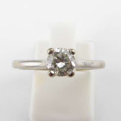 Lot 853 - An 18ct white gold diamond solitaire ring, the...