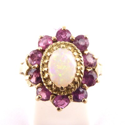 Lot 993 - An 9ct gold opal and pink topaz set cluster...