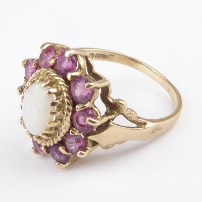 Lot 875 - An 9ct gold opal and pink topaz set cluster...
