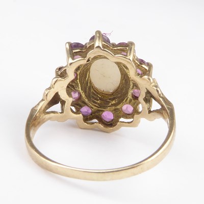 Lot 875 - An 9ct gold opal and pink topaz set cluster...