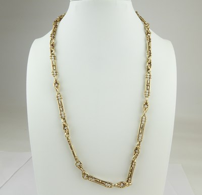 Lot 1132 - A 9ct gold fancy bar and rope twist link...
