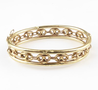 Lot 1020 - A 19th century gold hinged bracelet, the...