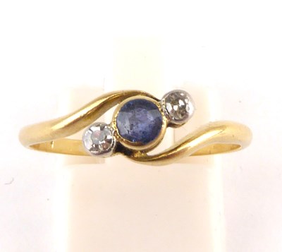 Lot 1007 - An 18ct gold diamond and sapphire crossover...