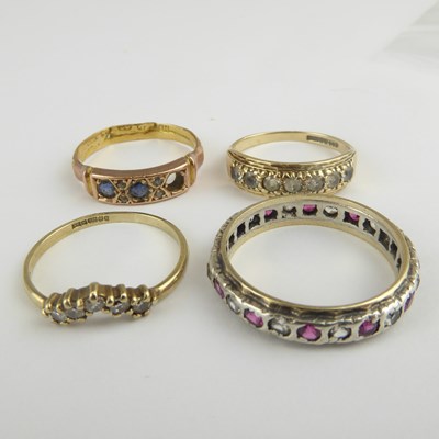 Lot 897 - Four 9ct gold dress rings, comprising a...