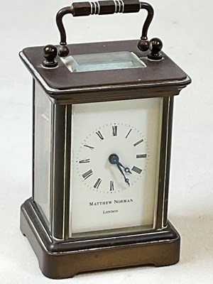 Lot 488 - MATTHEW NORMAN; a brass carriage clock of...