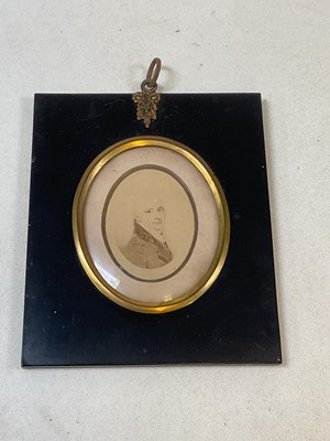 Lot 24 - A mid 19th century miniature portrait...