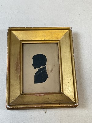 Lot 24 - A mid 19th century miniature portrait...