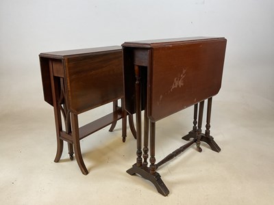 Lot 592 - Two mahogany Sutherland tables of typical form...