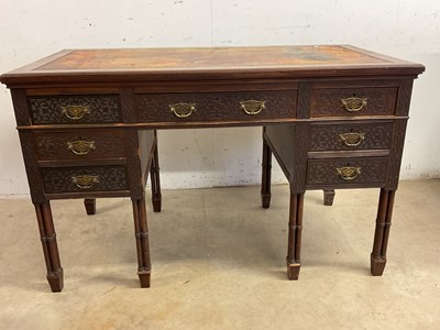 Lot 544 - An Edwardian mahogany and fret detailed desk...