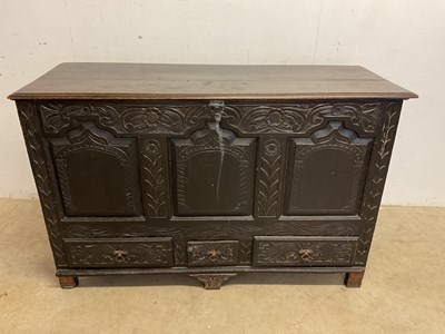 Lot 575 - A metal lined 18th century carved oak blanket...