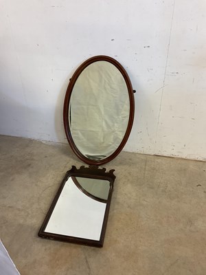 Lot 646 - A fretwork wall mirror and a mahogany oval...