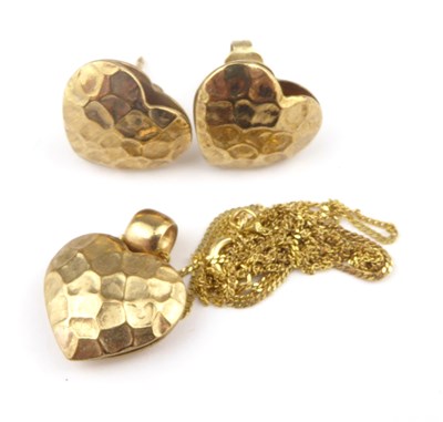 Lot 1217 - A 9ct gold heart-shaped pendant on a 9ct gold...