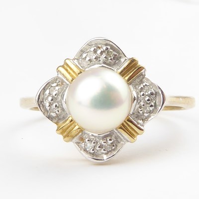 Lot 930 - A 9ct gold pearl and diamond set cluster ring...