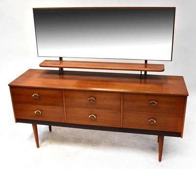 Lot 35 - A 1970s mirror back teak dressing table with...