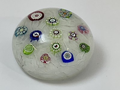 Lot 226 - PERTHSHIRE; a latticino domed paperweight with...