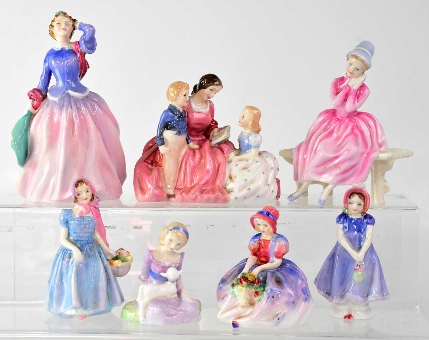 Lot 296 - ROYAL DOULTON; seven figures of ladies and...