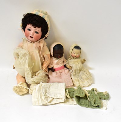 Lot 209 - A German bisque headed Oriental doll with...
