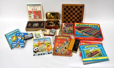 Lot 217 - A quantity of vintage toys and books including...