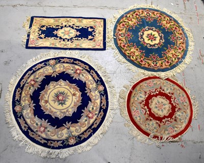 Lot 97 - Four small modern Chinese rugs with blue and...