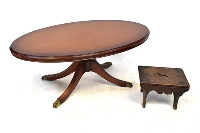 Lot 37 - A reproduction mahogany Regency-style oval...