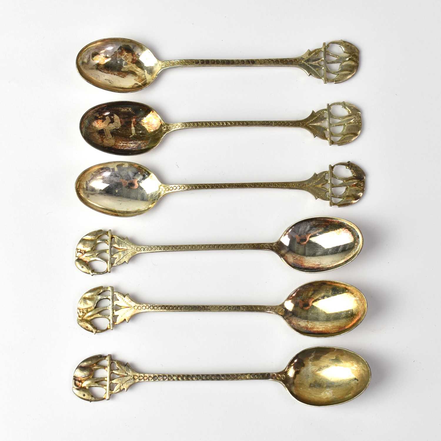 Lot 563 - A set of six Indian silver teaspoons with palm...