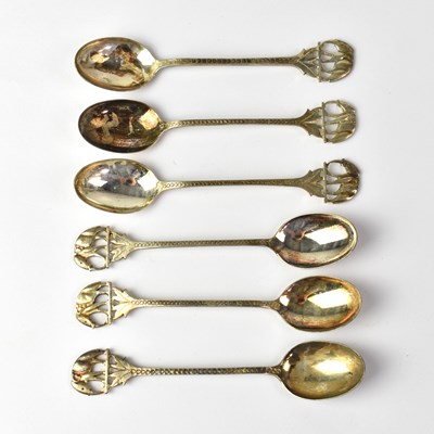 Lot 563 - A set of six Indian silver teaspoons with palm...