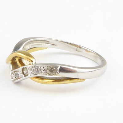 Lot 916 - An 18ct two-tone gold ring, a white gold...