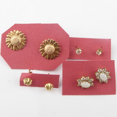 Lot 1189 - Four pairs of 9ct gold stud earrings...