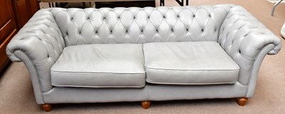 Lot 2554 - THOMAS LLOYD; a grey leather Chesterfield sofa,...