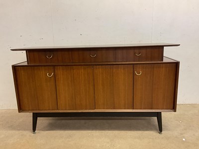 Lot 545 - An E Gomme G plan sideboard and dining table;...