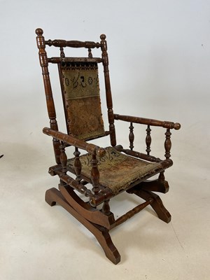 Lot 627 - An early 20th century child's American rocking...