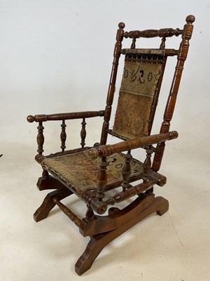 Lot 627 - An early 20th century child's American rocking...