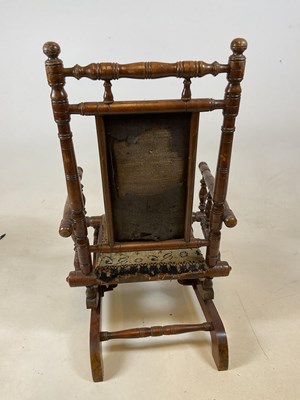 Lot 627 - An early 20th century child's American rocking...