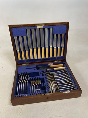 Lot 421 - WALKER & HALL; a silver plated canteen of...