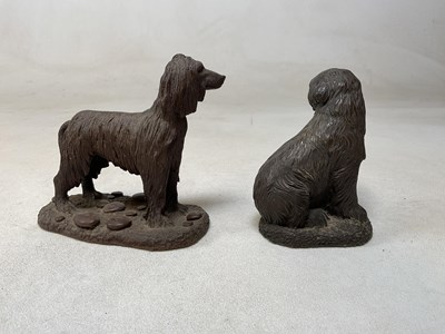 Lot 60 - HEREDITIES; two bronzed resin dogs, largest...