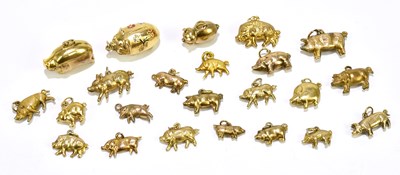 Lot 158 - A group of 9ct yellow gold pig charms,...