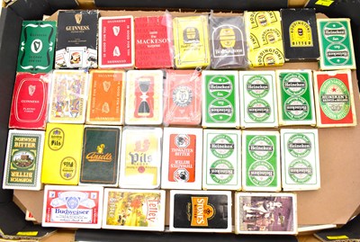 Lot 492 - Sixty packs of playing cards, all with beer...