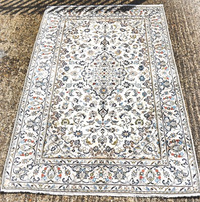 Lot 103 - A hand knotted Persian Heriz carpet decorated...