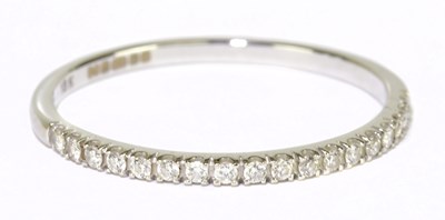 Lot 58 - An 18ct white gold and diamond set half...