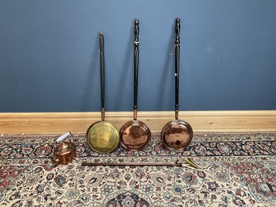 Lot 2151 - Three copper and brass warming pans, together...